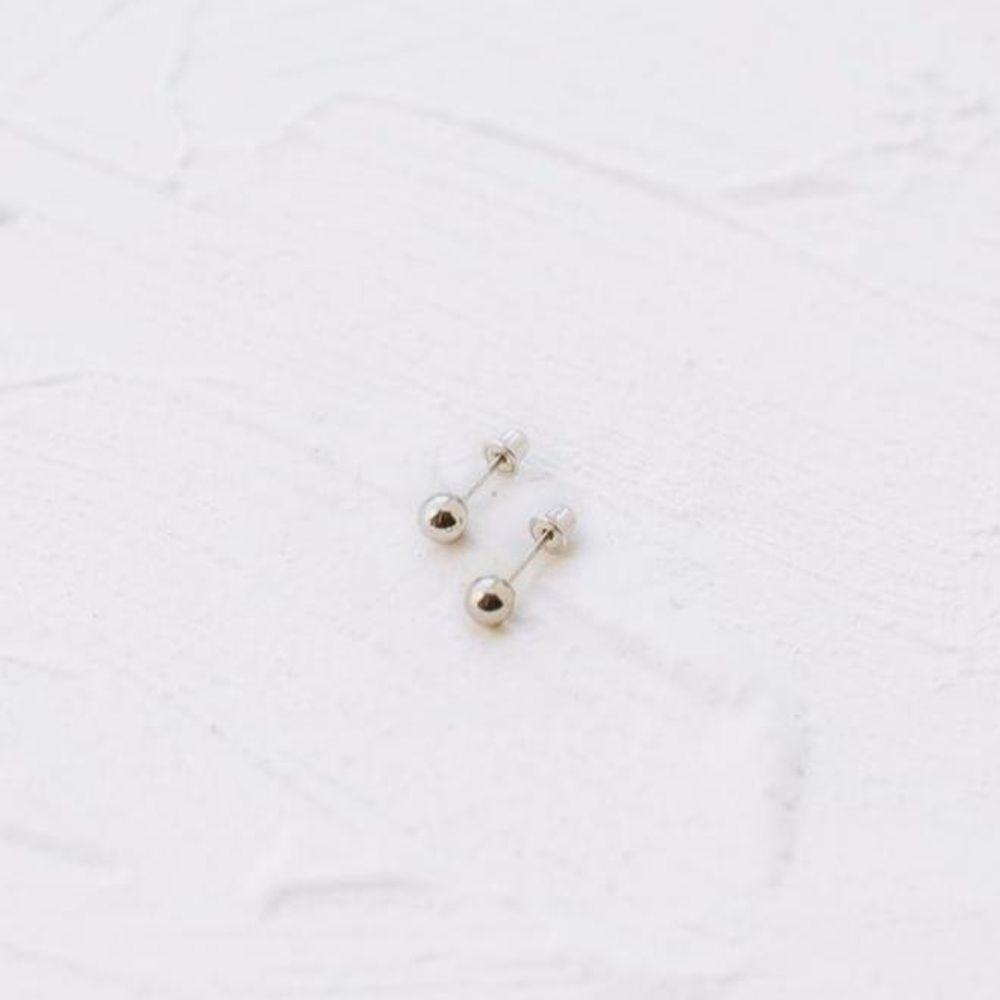 Small White Gold Studs from OIYA - SHOPELEOS